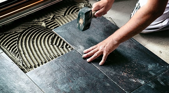 Person-installling-new-flooring