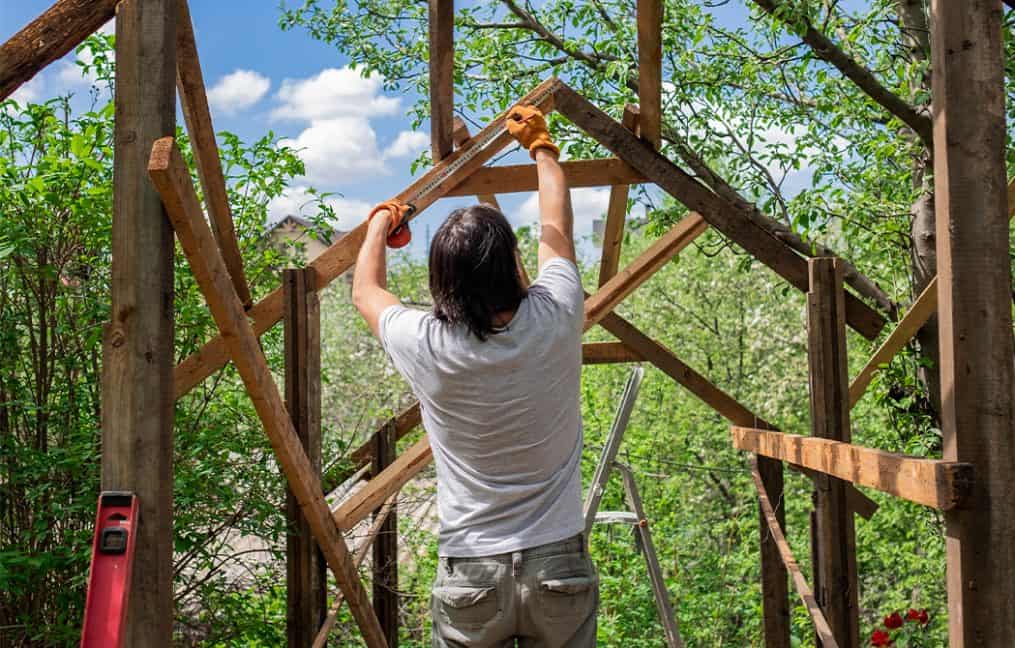 Man-Building-a-Shed