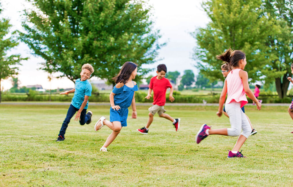 Children playing on playground field