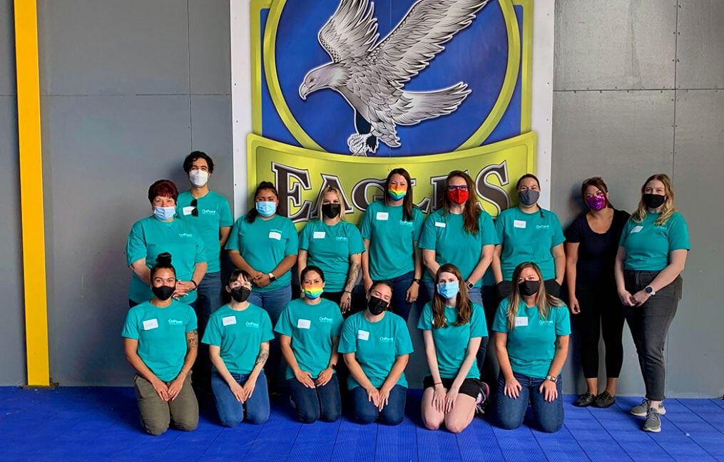OnPoint employees pose for a photo after volunteering with Serendipity Center
