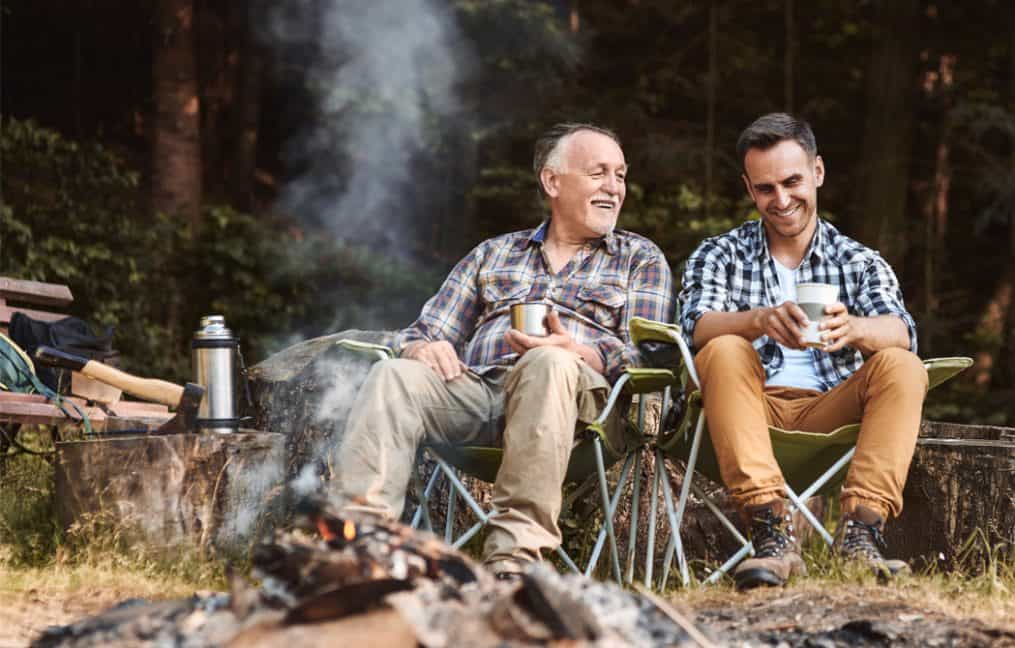 Father and son discussing investments