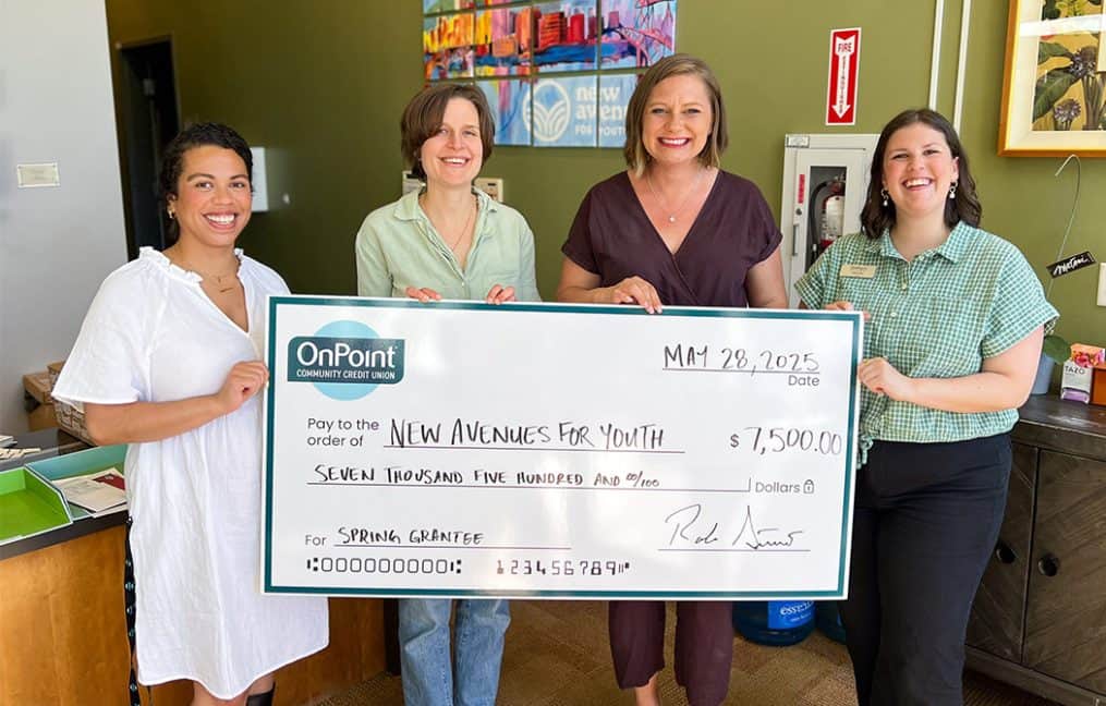 OnPoint Community Credit Union New Avenues for youth check presentation apply for funding catie ellis alexa wiles