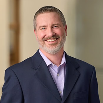 Andy Herrington OnPoint Mortgage Professional Headshot Bank Back drop