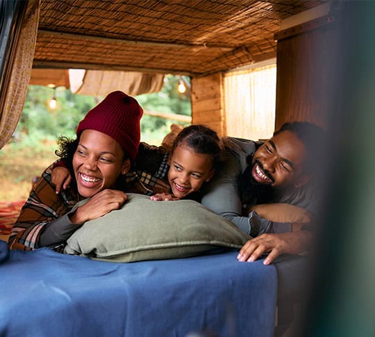 Family in camper van laughing onpoint raymond james investment oregon washington