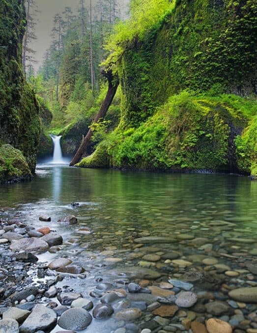 waterfall with rocks in foreground