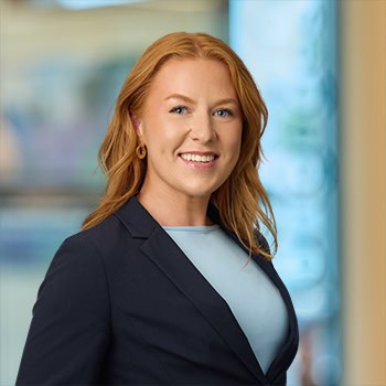 Rebekah James OnPoint Mortgage Professional Headshot Bank Back drop