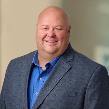 Brandon Jensen OnPoint Mortgage Professional Headshot Bank Back drop