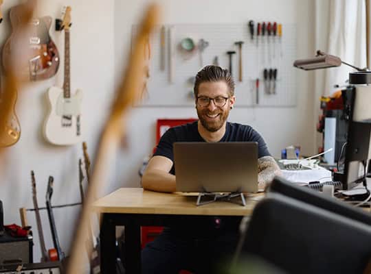 business owner in guitar repair show onpoint business membership