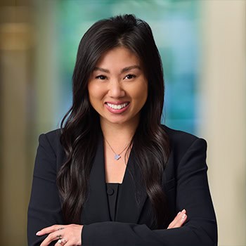 tran luu OnPoint Mortgage Professional Headshot Bank Back drop