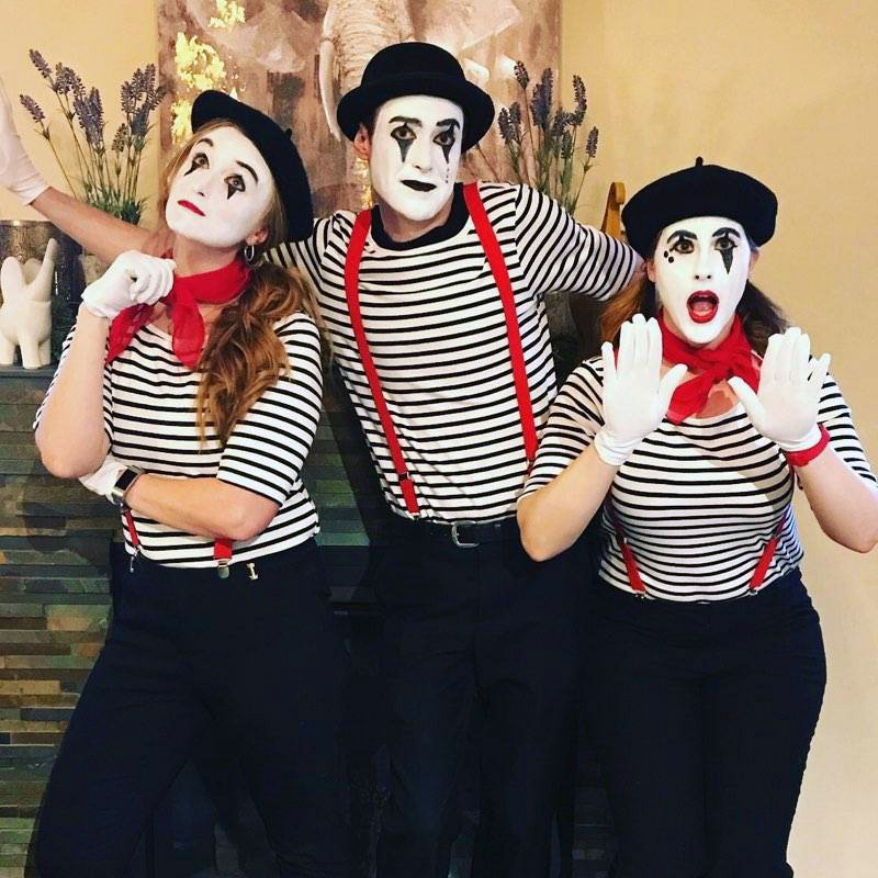 Alex and team dressed up as Mime's for an annual charity spelling bee.