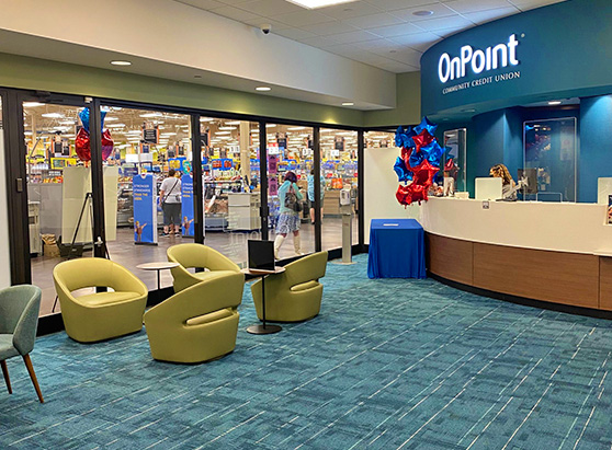 Inside OnPoint Orchards branch lobby looking out into Fred Meyer check stands