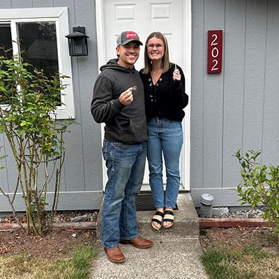 rachelanne and isaiah outside new home onpoint community credit union spotlight