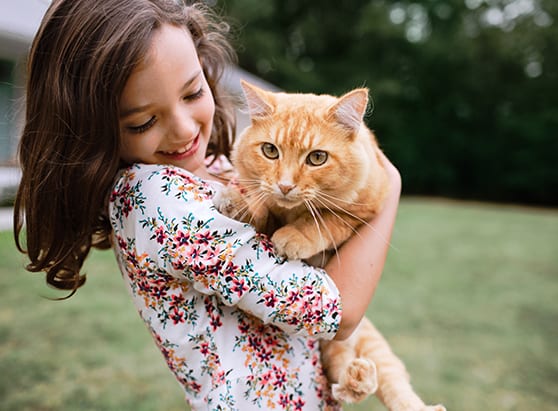 girl-holding-a-cat