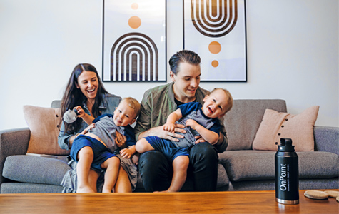 savings accounts-local Family parents and twins playing in their living room