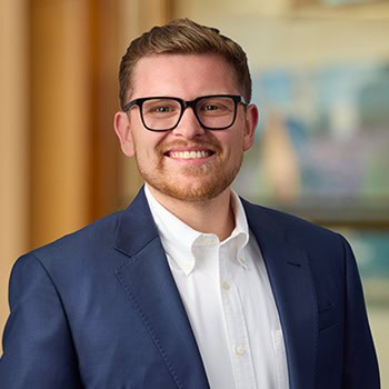Jacob Serrano OnPoint Mortgage Professional Headshot Bank Back drop