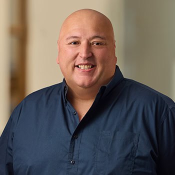 Tony Smith OnPoint Mortgage Professional Headshot Bank Back drop