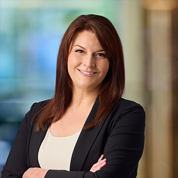 Traci Sorenson OnPoint Mortgage Professional Headshot Bank Back drop