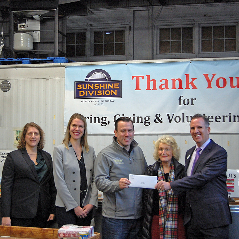 Spreading Holiday Cheer Through Our Employee Giving Program_Sunshine Check Presentation_square