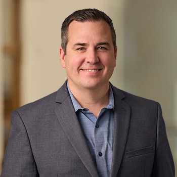 Neil Vandehey OnPoint Mortgage Professional Headshot Bank Back drop