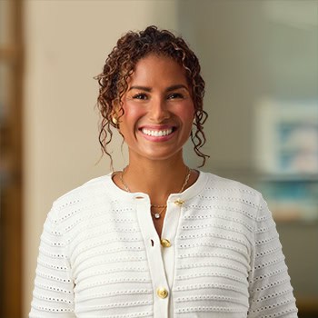 Melody Woodland OnPoint Mortgage Professional Headshot Bank Back drop