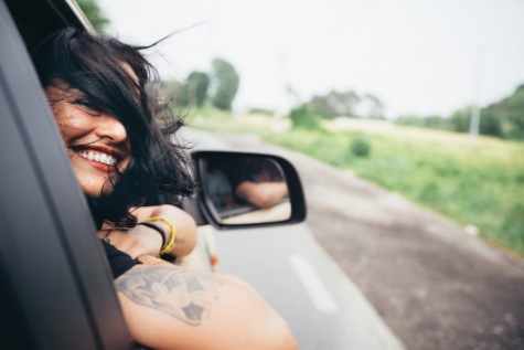 woman in car driving