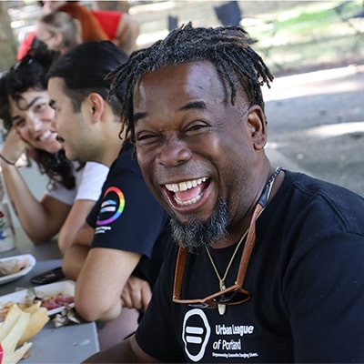 man smiling and laughing