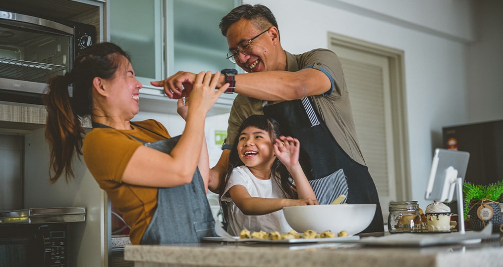 family cooking dinner together