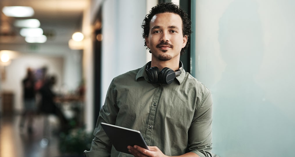 handsome young businessman standing in the office