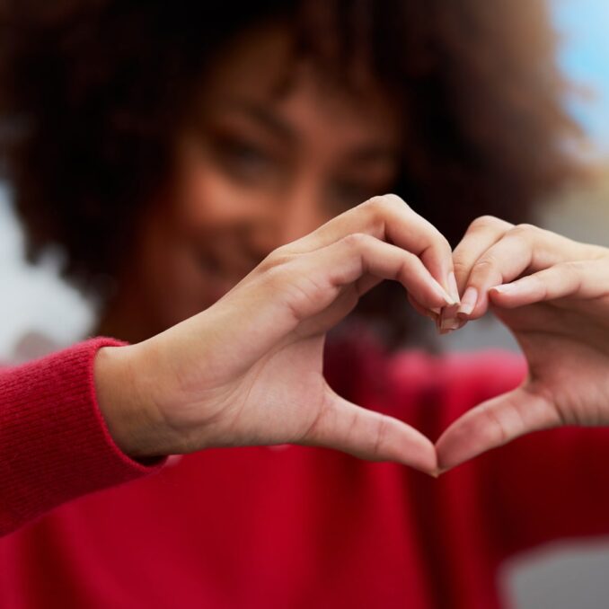 100k in donations on giving tuesday-hands and heart