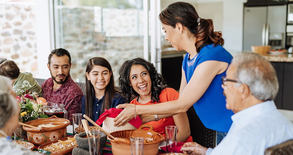 Hispanic family eating dinner