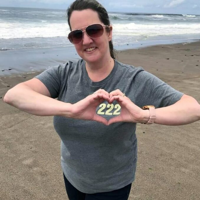 Jennifer Schmitz Employee Spotlight- Jenny at the beach - heart