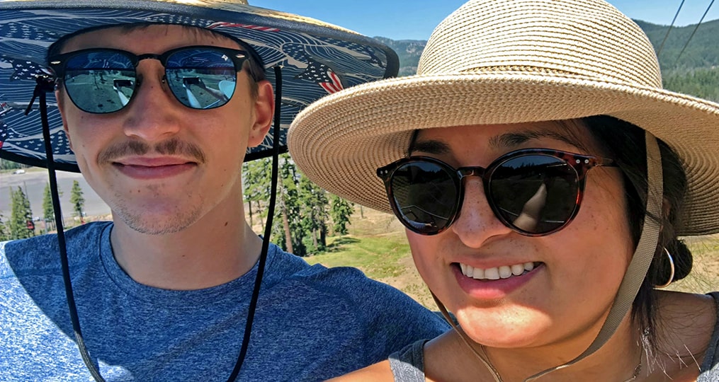 employee spotlight with Kendra Ireheta-Kendra and partner wearing big straw hats