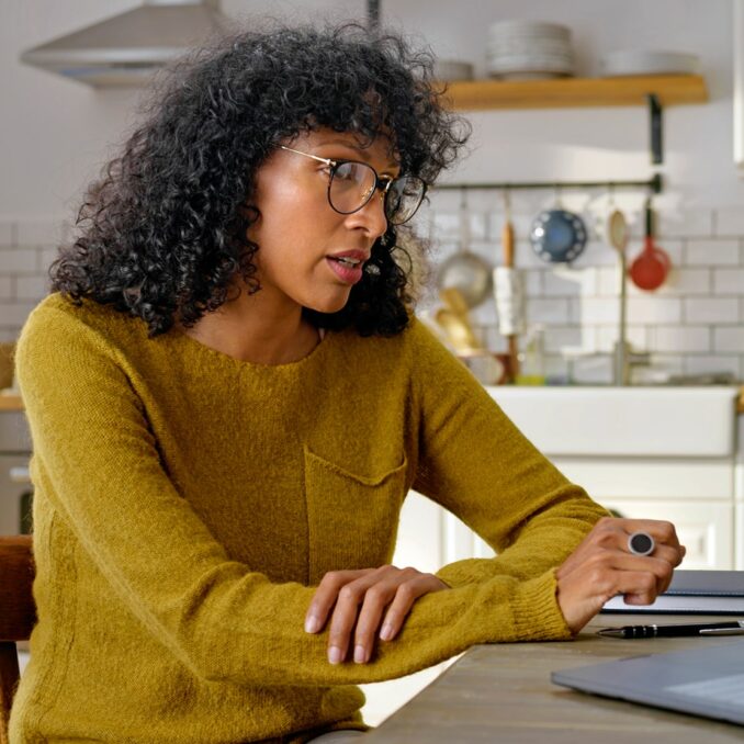 home buyer in a sellers market-focus on your preparation-woman doing research