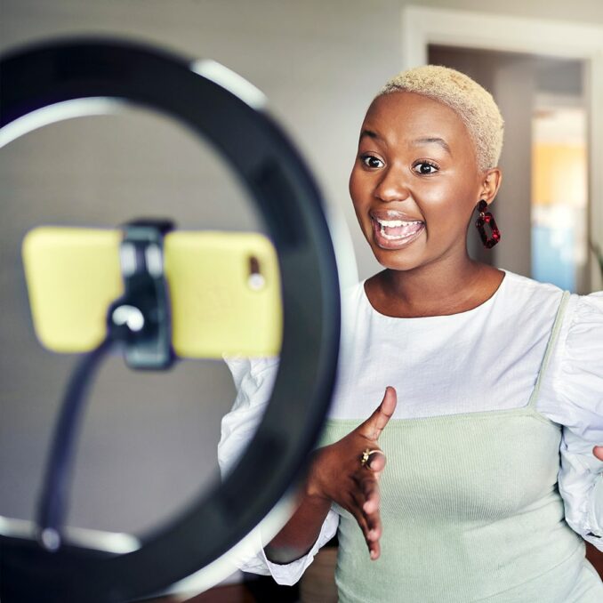 protect your privacy on social media how much is too much-woman influencer recording content at home