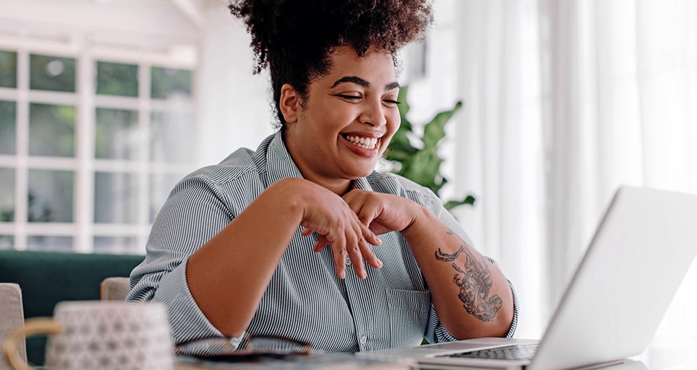 relaunching your career with a returnship-woman sitting at her desk taking an interview