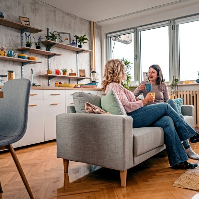the real cost of free apps-two women sitting on a couch talking