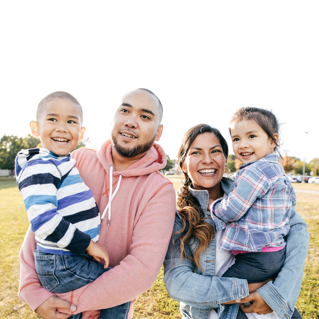 Family looking hopfully towards a new home