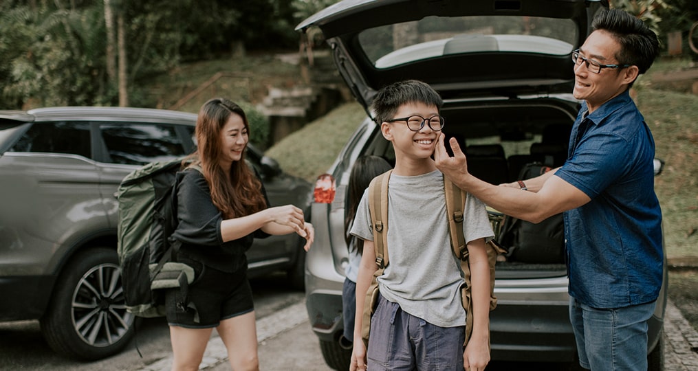 Auto Finance Advice What You Need To Know About Financing a Car_asian family preparing for a hike