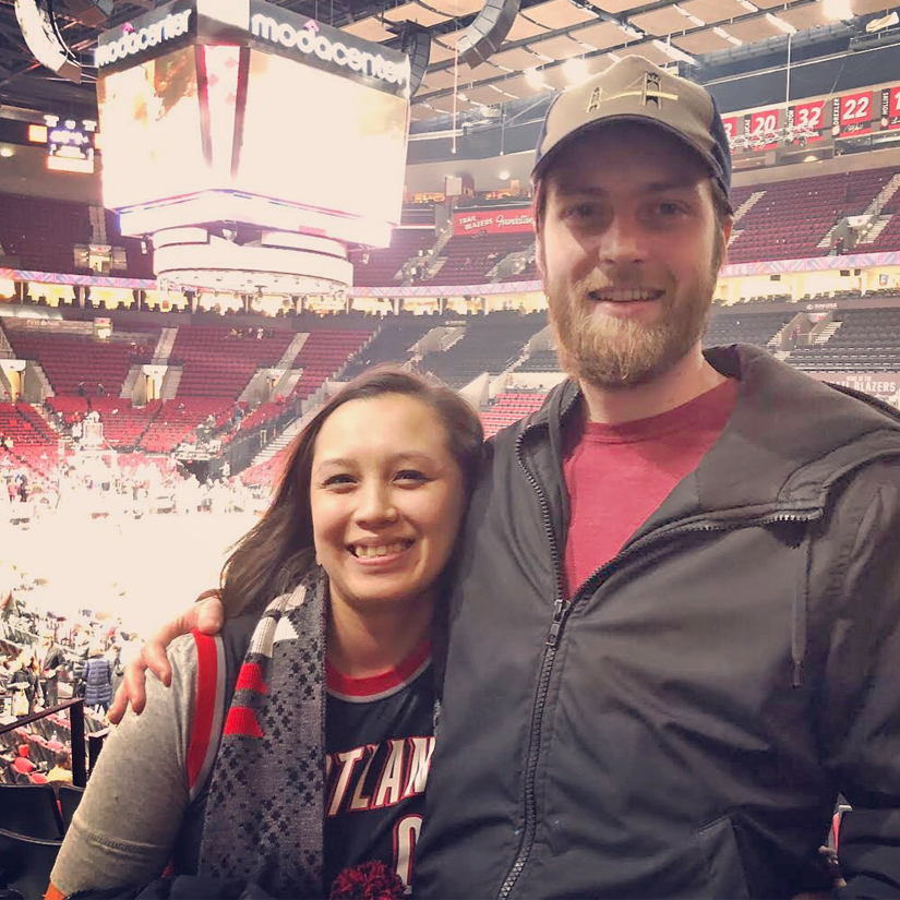 Britney Small and her husband at a blazers game