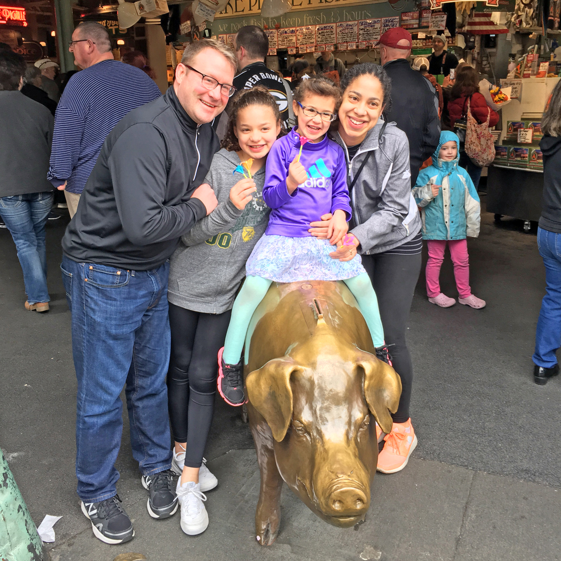 Guy Poppe with his family in Seattle at Pike Place Market