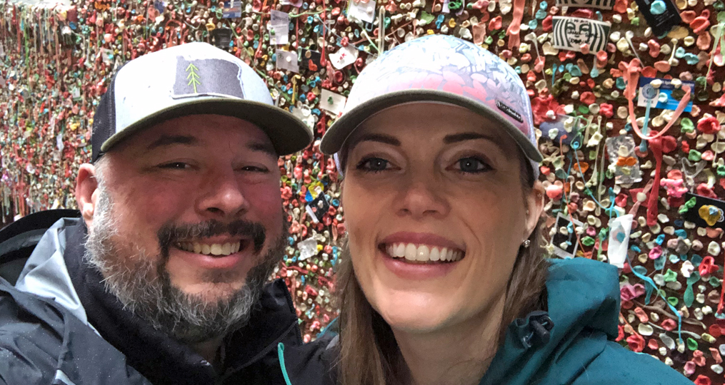 Heather Kesterson Employee Spotlight_Heather and her partner in front of gum wall