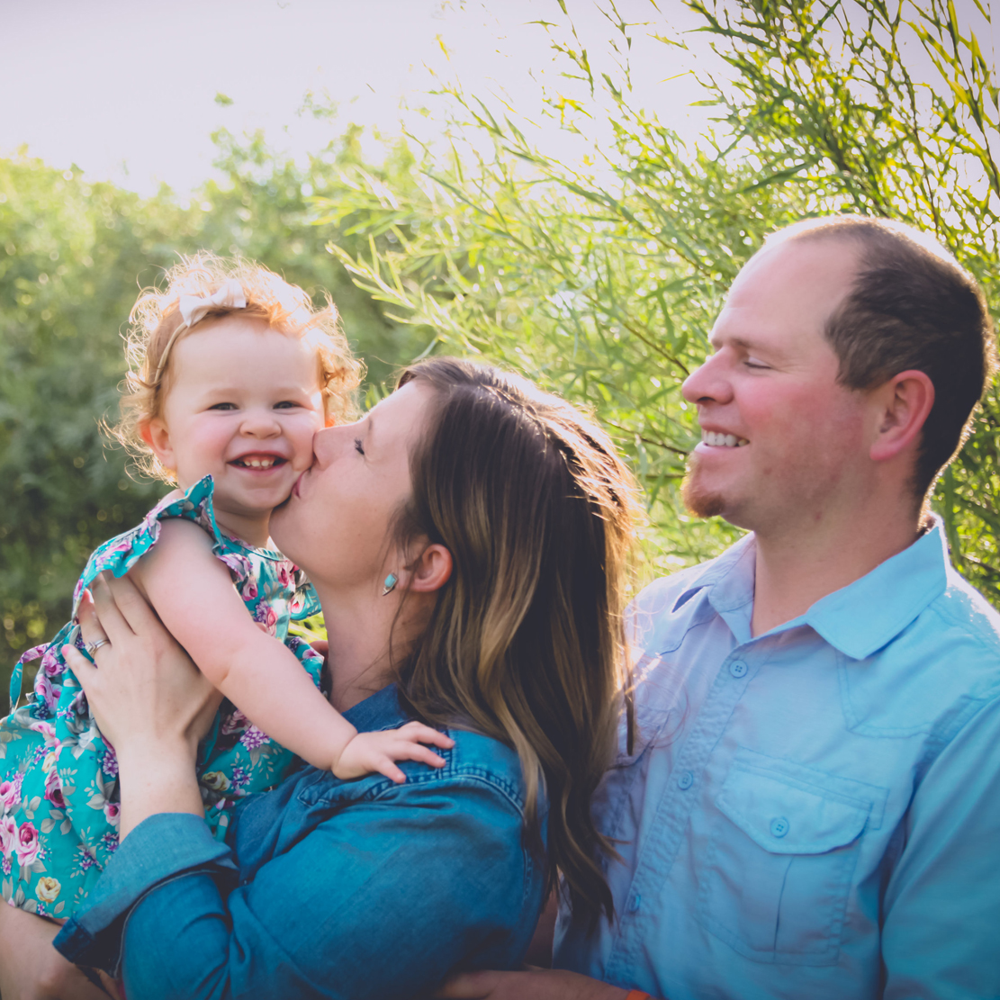 Heather Martin with her daughter and her husband family photo