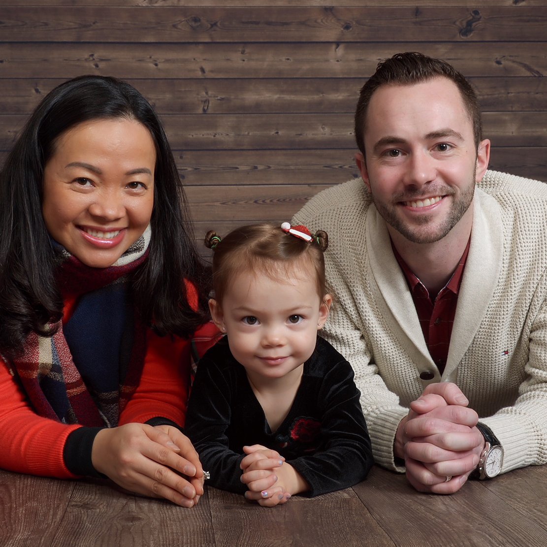 Jason Hinkle with his family in a holiday portrait