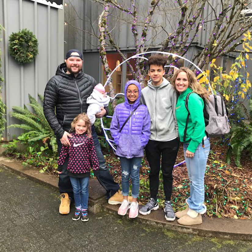 Kara and her family on one of their visits to Disneyland