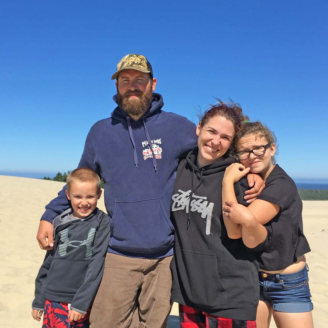 Leanne Baker and her family at the beach on a sunny day