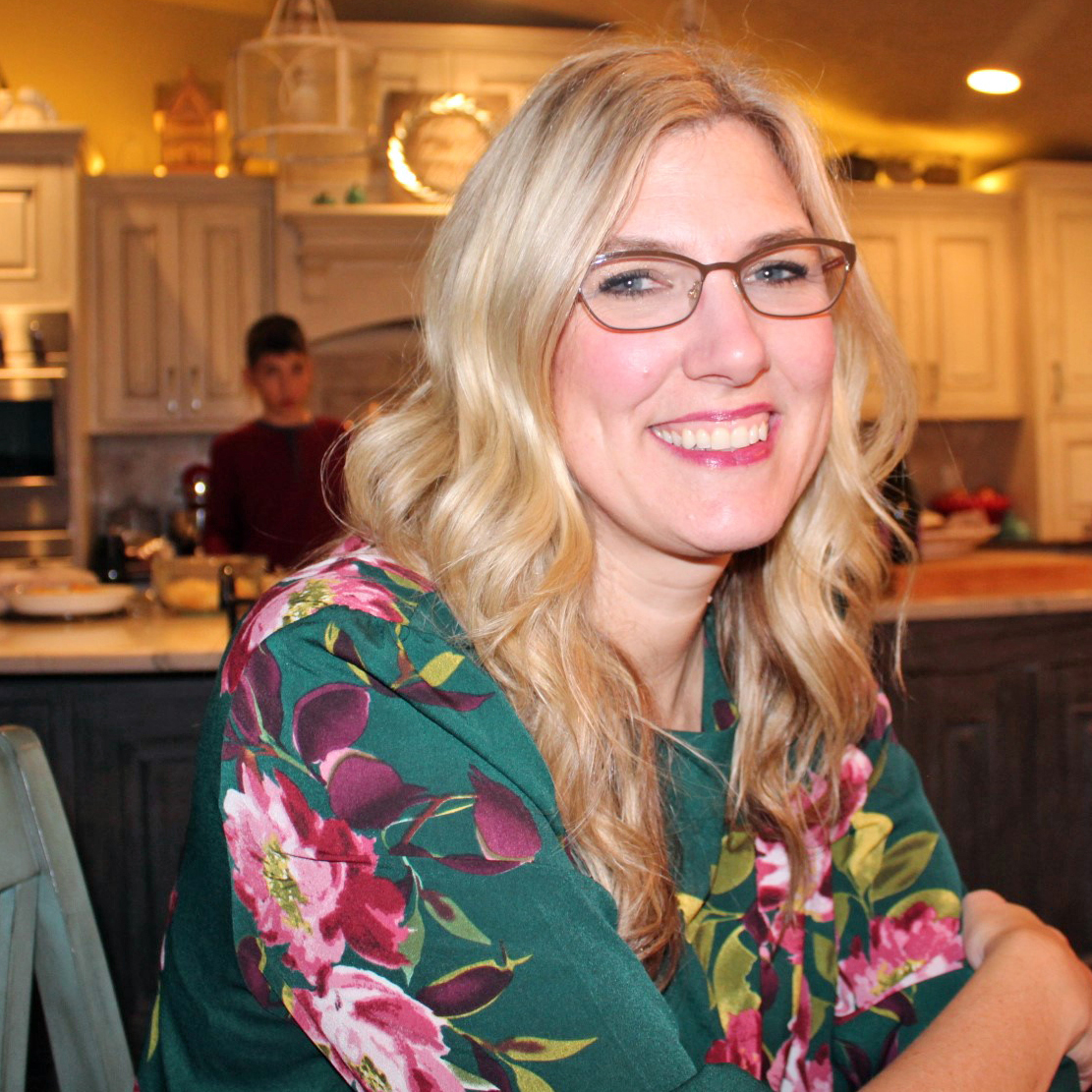 Leanne Skoog sitting at her kitchen table