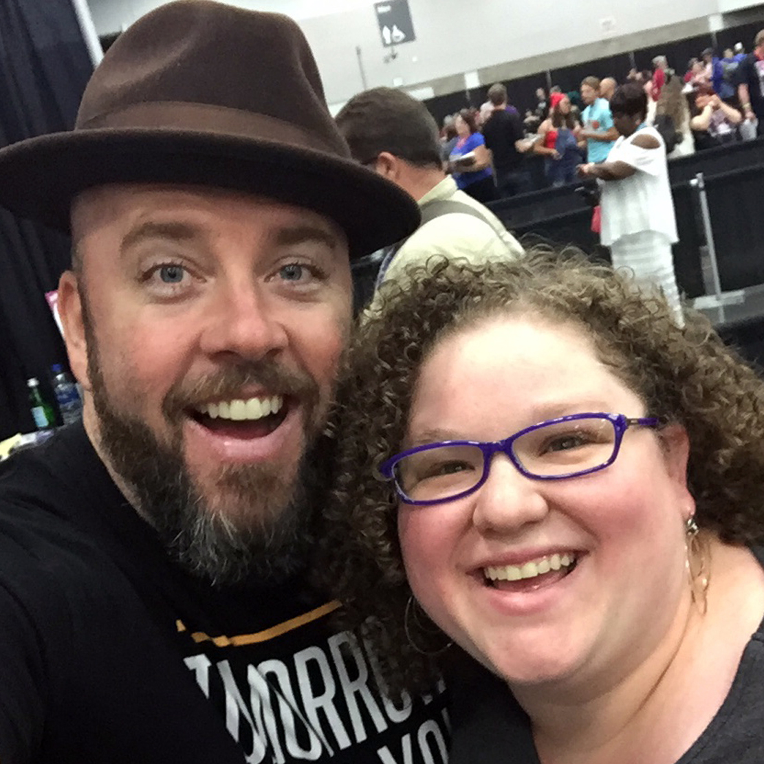 Meghan and Chris hanging out at an event