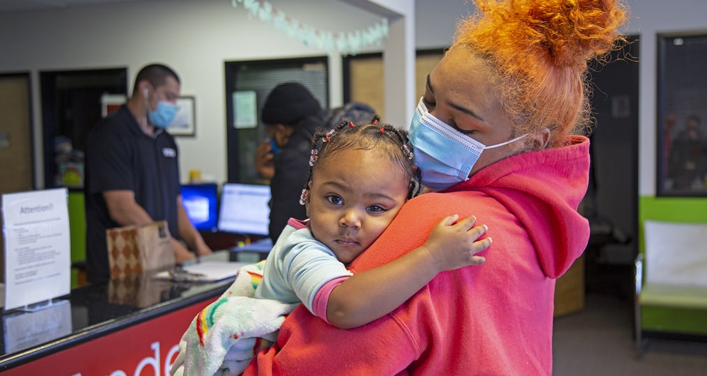 POIC + RAHS_student with her young child