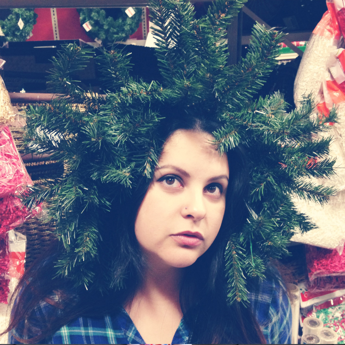 Vanessa Mijares wearing a wreath as a holiday hat