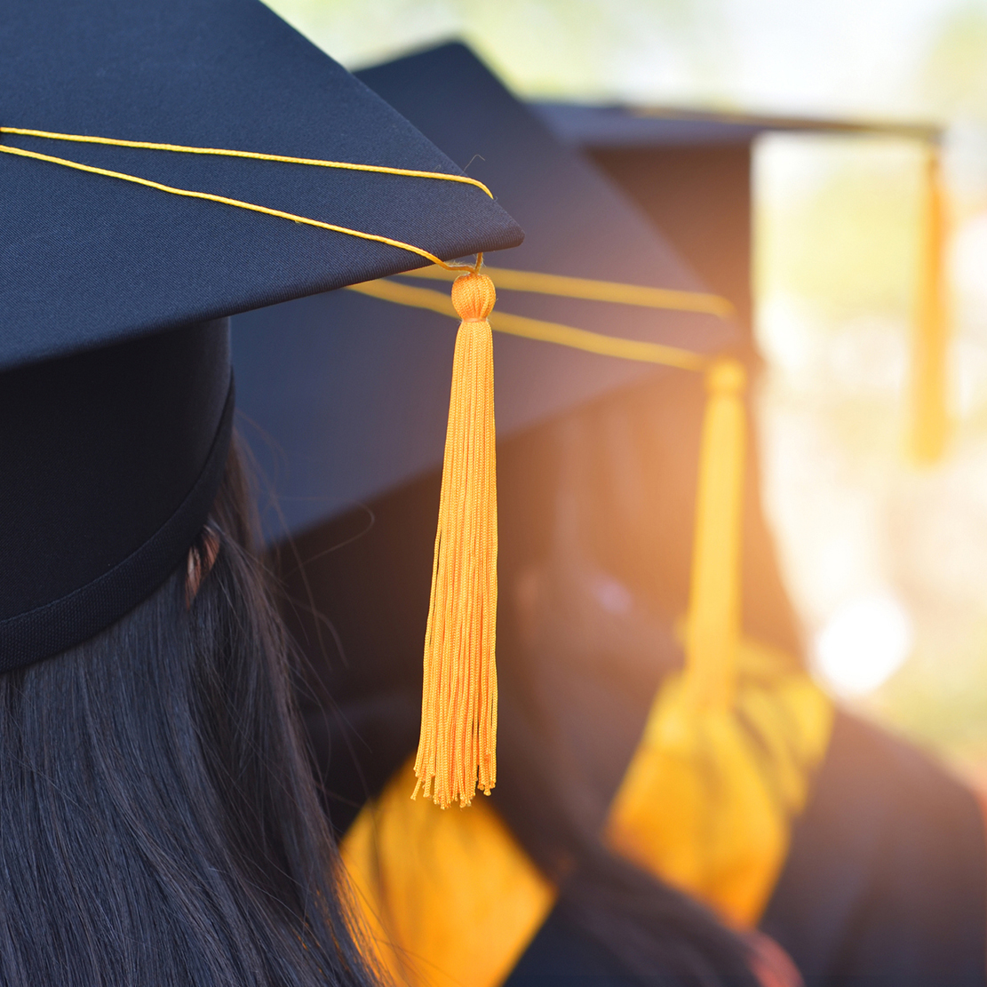 graduates wearing graduation gowns